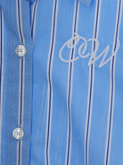 Camicia per bambina Off-White Kids azzurro con design a righe 44GGA018S26F001 430 OFF WHITE KIDS 