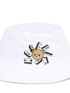 Cappello per neonati Moschino Kids bianco con stampa Teddy Bear MNX057LPA01 10101 MOSCHINO KIDS 