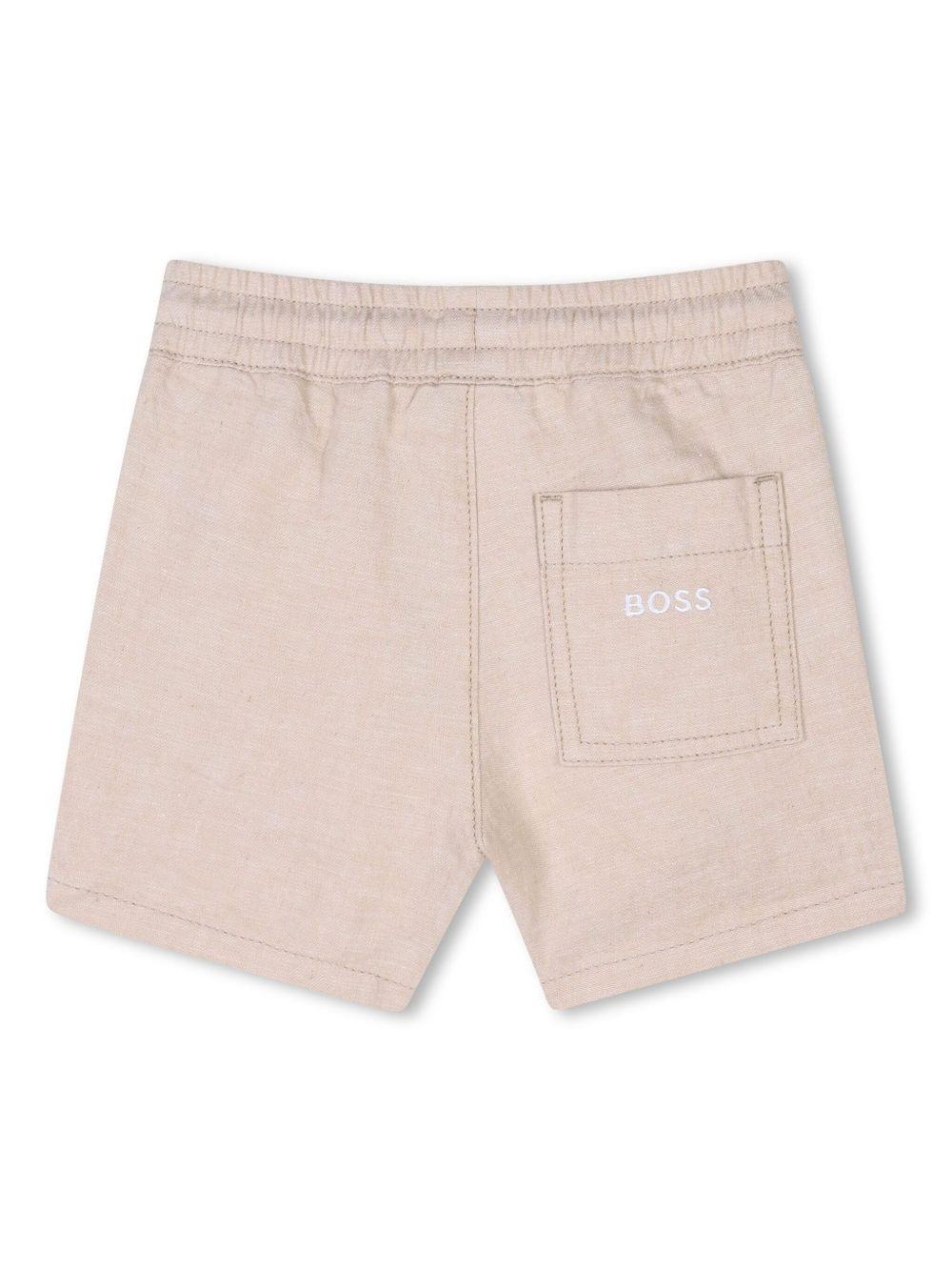 Shorts con ricamo per neonato BOSS Kidswear beige con logo sul retro J52082 249 BOSS KIDS 