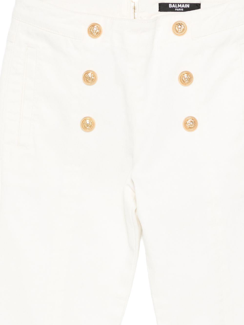 Pantaloni per bambina Balmain Kids bianchi con bottoni dorati BY6A51 Z3702 100 BALMAIN KIDS 