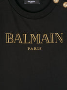 T-shirt con logo glitter per bambina Balmain Kids nero con bottoni oro BV8B91 Z0082 930OR BALMAIN KIDS 