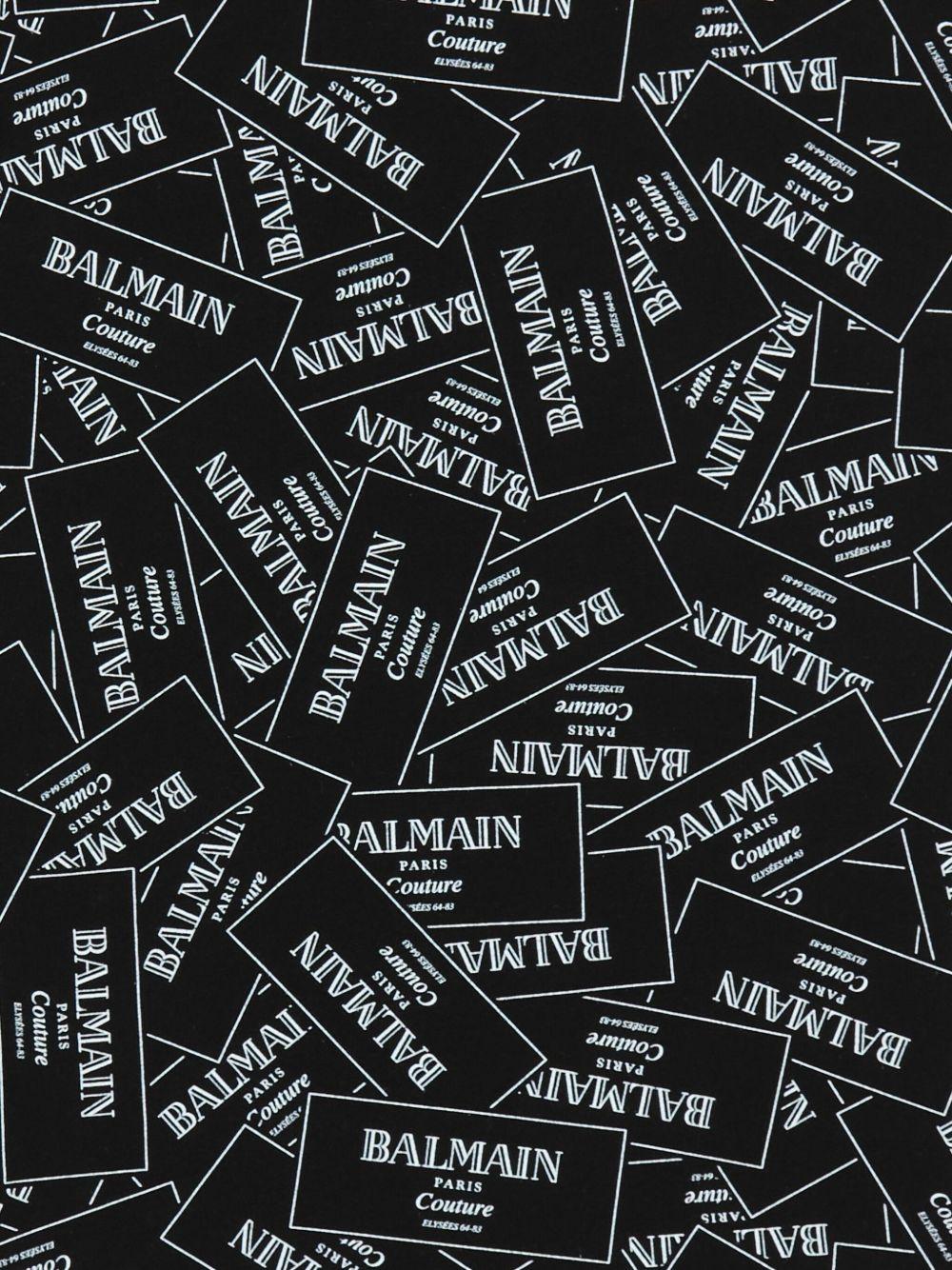 T-shirt per bambino Balmain Kids nero con logo all-over BX8Q11 Z3186 930BC BALMAIN KIDS 