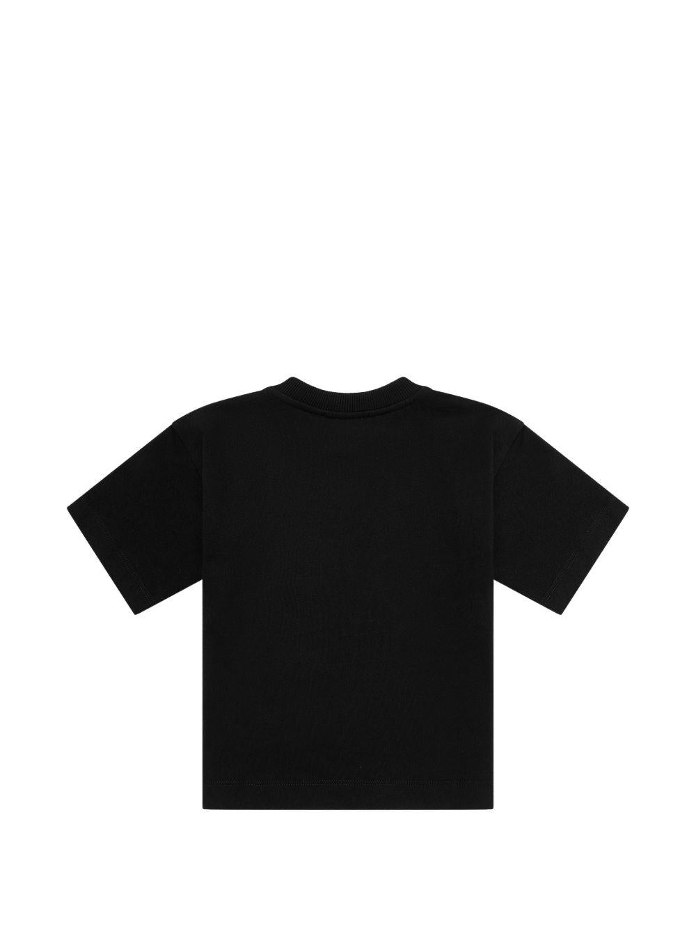 T-shirt per bambino Moschino Kids nera con taschino sul petto HUM05MLAA01 60100 MOSCHINO KIDS 
