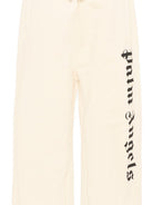 Pantaloni sportivi per bambino Palm Angels Kids beige con logo laterale PBCH008S26FLE001 002 PALM ANGELS KIDS 