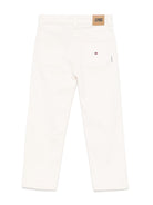 Jeans affusolati per bambino Tommy Hilfiger Junior bianco con design cinque tasche - Rubino Kids