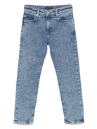 Jeans con logo ricamato per bambino Tommy Hilfiger Junior blu con toppa con logo sul retro - Rubino Kids