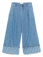 Jeans per bambina Fendi Kids in denim modello svasato con risvolto - Rubino Kids