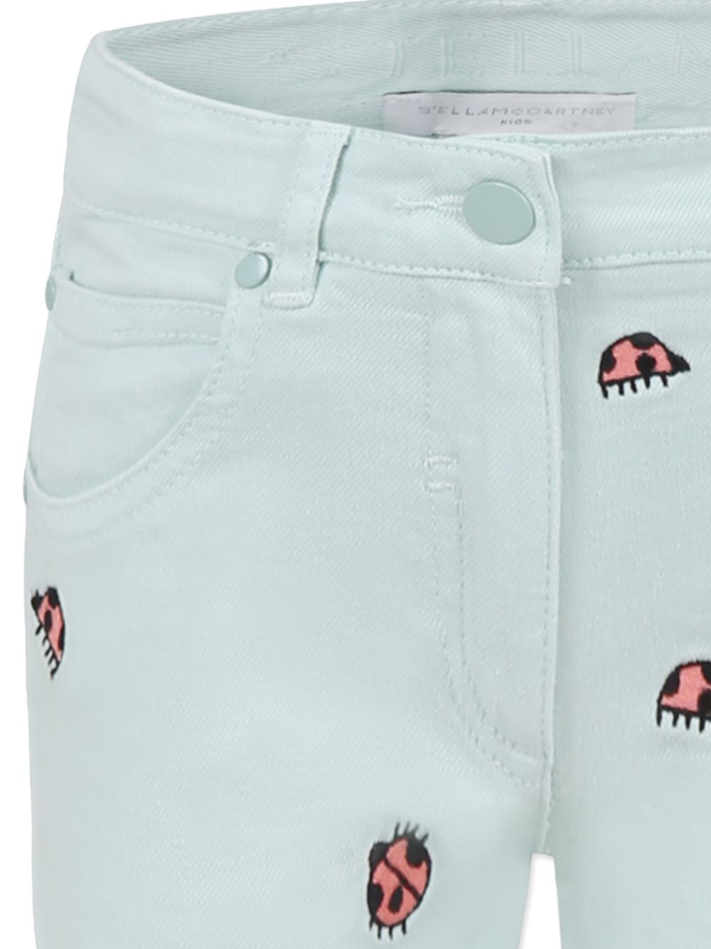 Jeans per bambina Stella McCartney Kids azzurro con ricamo coccinella - Rubino Kids