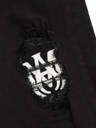 Jeans per bambino Amiri Kids nero con toppa con logo - Rubino Kids