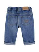 Jeans per neonato Givenchy Kids in denim con orlo risvoltato - Rubino Kids