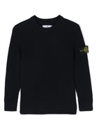 Maglione con applicazione Compass per bambino Stone Island Junior nero con lavorazione a coste - Rubino Kids