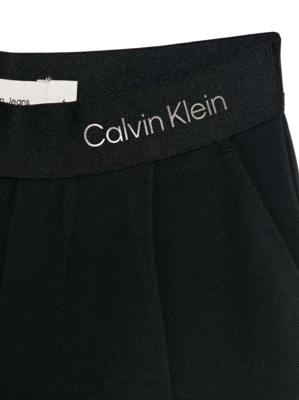 Pantaloni con banda logo per bambina Calvin Klein Kids nero con dettagli plissettati - Rubino Kids