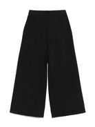 Pantaloni con banda logo per bambina Calvin Klein Kids nero con dettagli plissettati - Rubino Kids