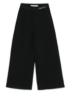 Pantaloni con banda logo per bambina Calvin Klein Kids nero con dettagli plissettati - Rubino Kids