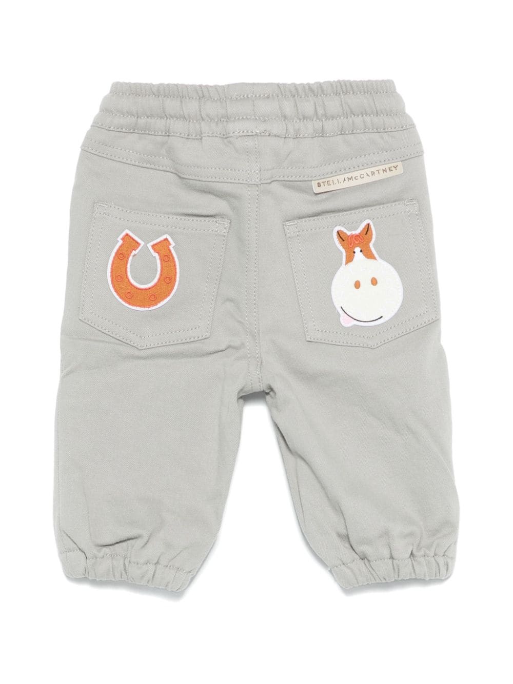 Pantaloni con logo - toppa per neonato Stella McCartney Kids grigio con elastico in vita - Rubino Kids