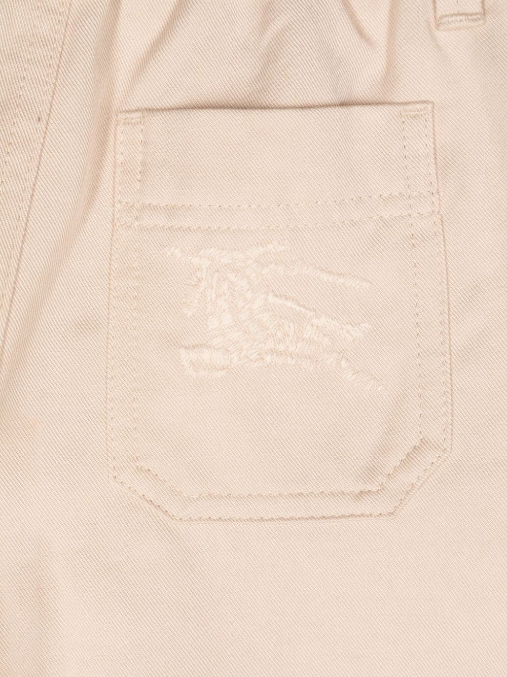 Pantaloni con motivo Equestrian Knight per neonato Burberry Kids beige con dettagli plissettati - Rubino Kids