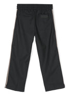 Pantaloni da tuta con logo in gomma per bambino Lanvin Enfant nero con piega stirata - Rubino Kids