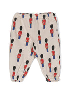 Pantaloni da tuta Little Tin Soldiers per neonato Bobo Choses beige con logo ricamato sul lato - Rubino Kids