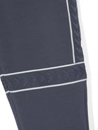 Pantaloni da tuta per bambino Emporio Armani Kids blu con nastro logo - Rubino Kids