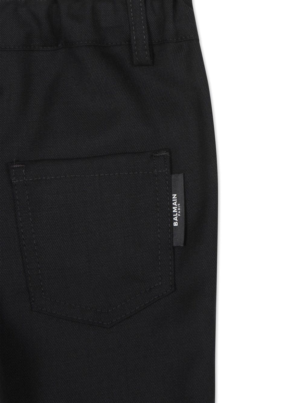 Pantaloni dritti con applicazione per neonato Balmain Kids nero con passanti - Rubino Kids