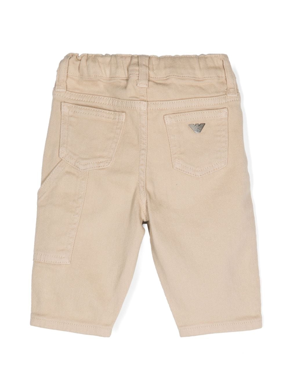 Pantaloni dritti per neonato Emporio Armani Kids beige a vita media in tessuto in twill - Rubino Kids