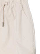 Pantaloni Parachute per bambino Calvin Klein Kids beige con tasca posteriore a filetto - Rubino Kids