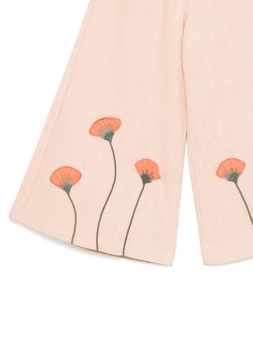 Pantaloni per bambina Donsje Fifis rosa con applicazione a fiori - Rubino Kids