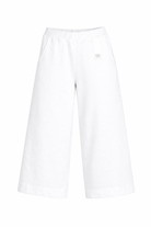 Pantaloni per bambina Douuod Kids bianchi con gamba larga - Rubino Kids