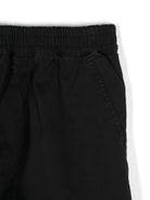 Pantaloni per bambino C.P. Company Kids nero con applicazione sulla gamba - Rubino Kids