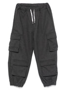 Pantaloni per bambino MSGM Kids grigio modello cargo affusolato - Rubino Kids