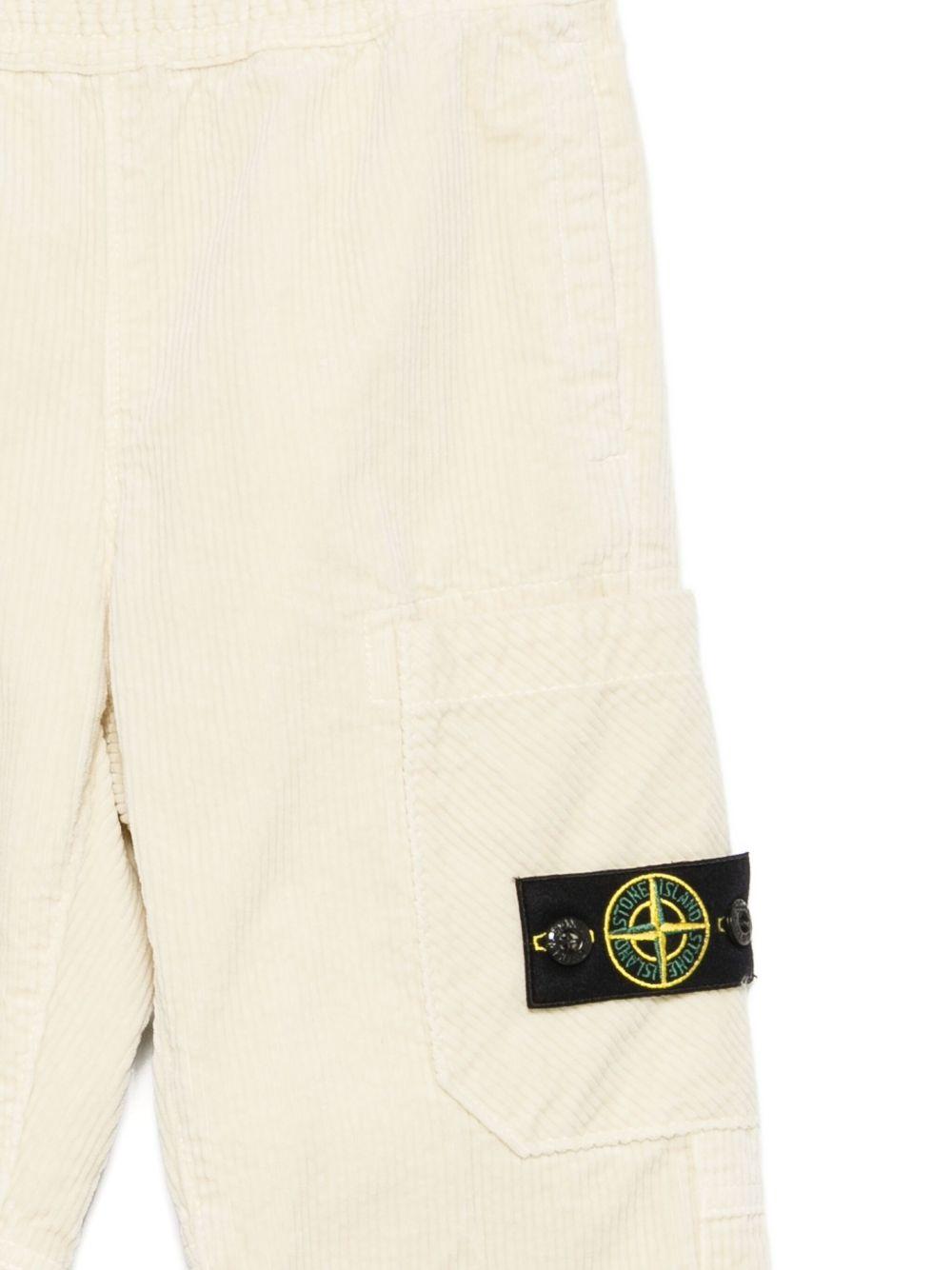 Pantaloni per bambino Stone Island Junior beige in velluto a coste con tasche applicate - Rubino Kids