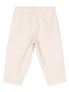 Pantaloni per neonati Donsje Phien beige con ruches sulle tasche laterali - Rubino Kids