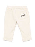 Pantaloni per neonato Moschino Kids beige chiaro a coste con logo sul retro - Rubino Kids