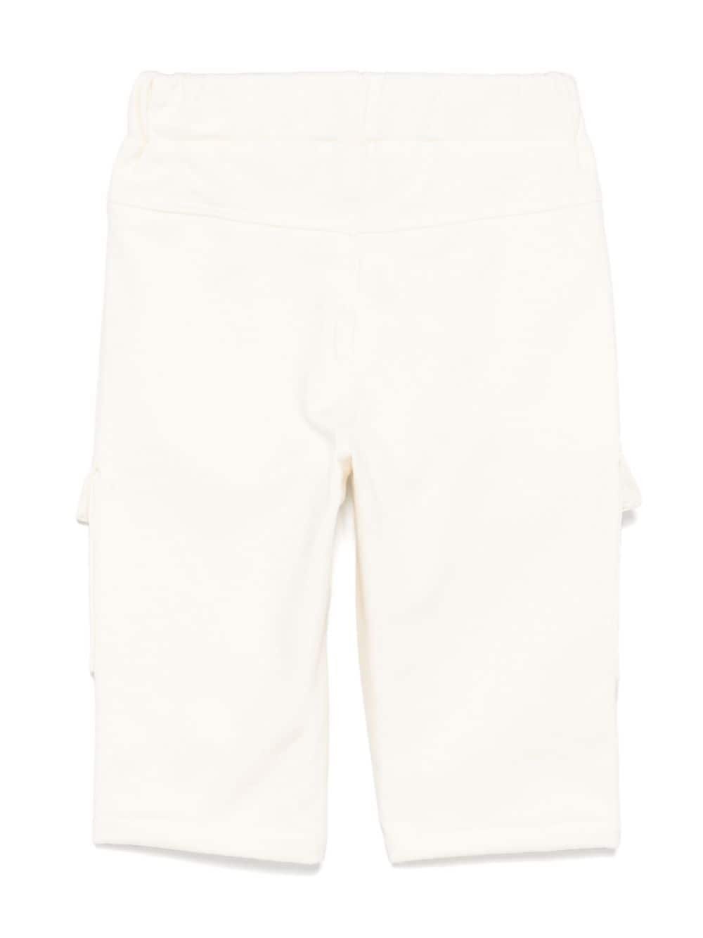 Pantaloni per neonato MSGM Kids bianco con tasche sul davanti - Rubino Kids