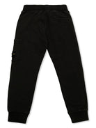 Pantaloni sportivi con applicazione logo per bambino Stone Island Junior nero con vita elasticizzata - Rubino Kids