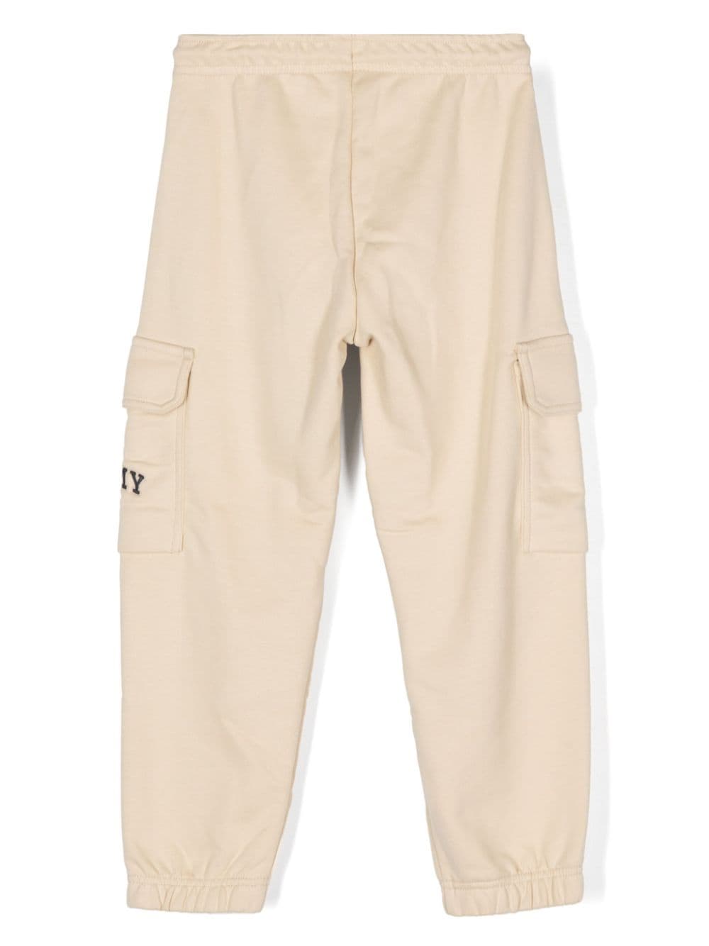 Pantaloni sportivi con ricamo per bambino Tommy Hilfiger Junior beige con logo laterale - Rubino Kids