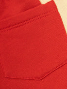 Pantaloni sportivi con stampa logo per neonato Versace Kids rosso con caviglie elasticizzate - Rubino Kids