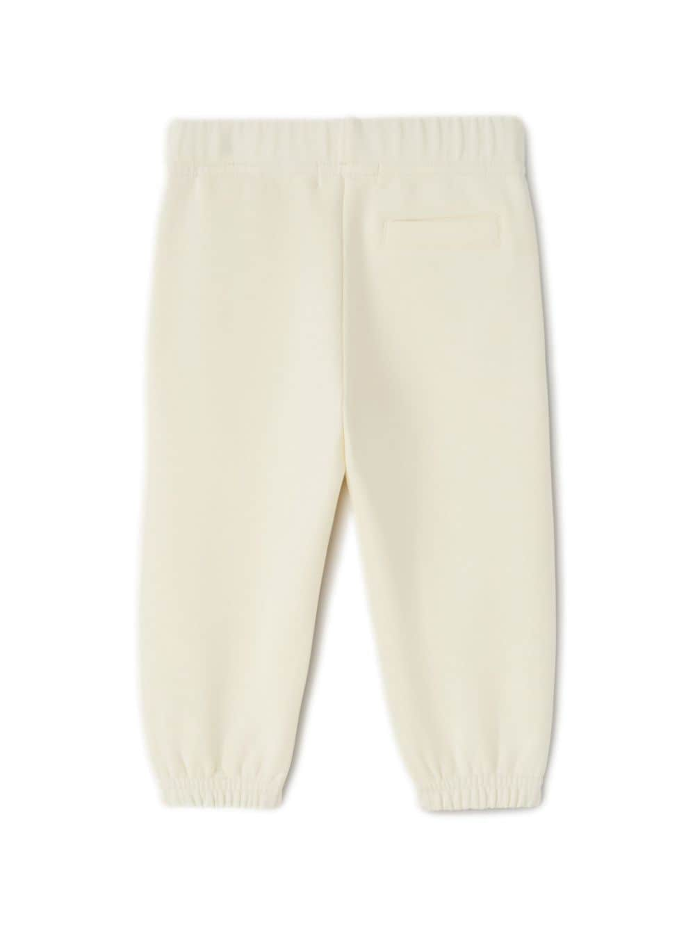 Pantaloni sportivi con stampa per neonato Palm Angels Kids bianco con orli elasticizzati - Rubino Kids