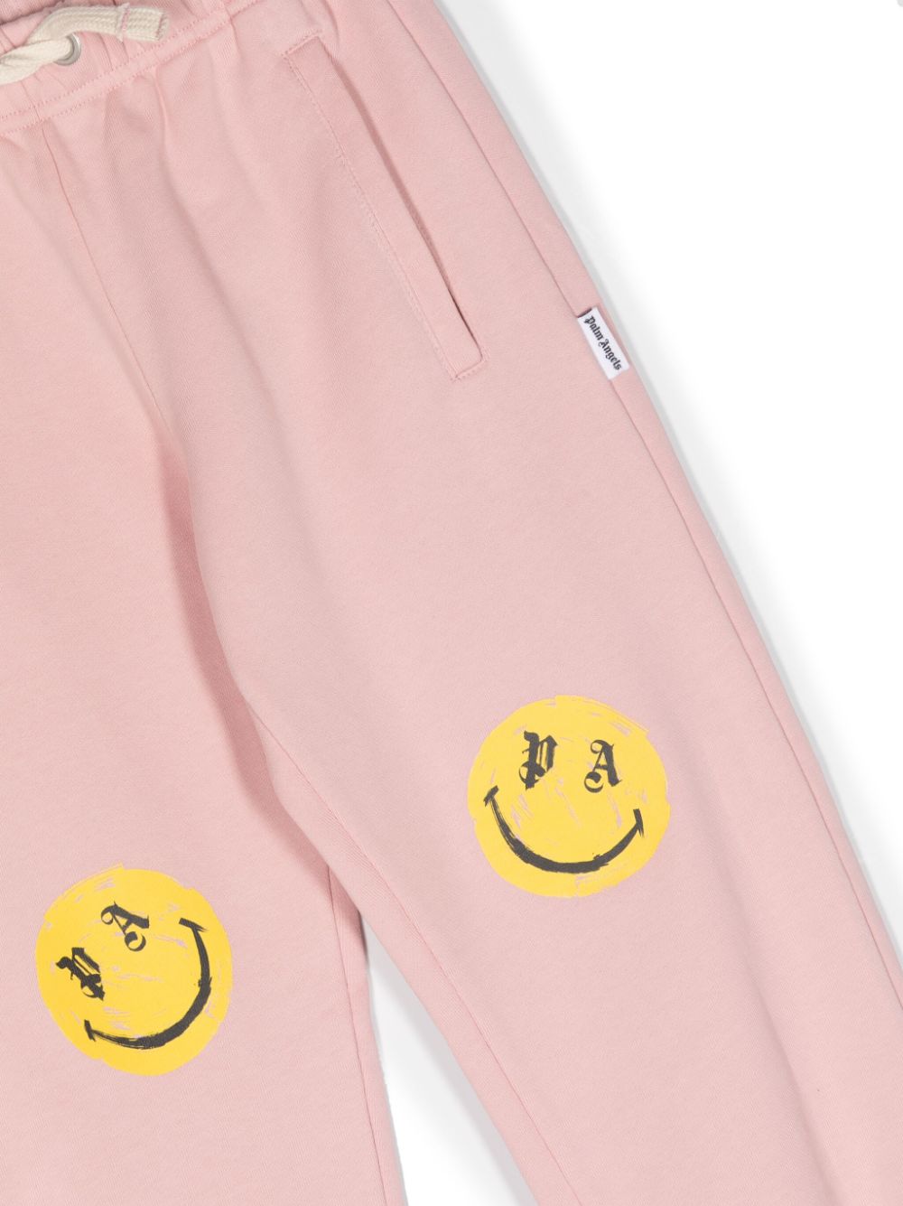 Pantaloni sportivi con stampa Smiley - Rubino Kids