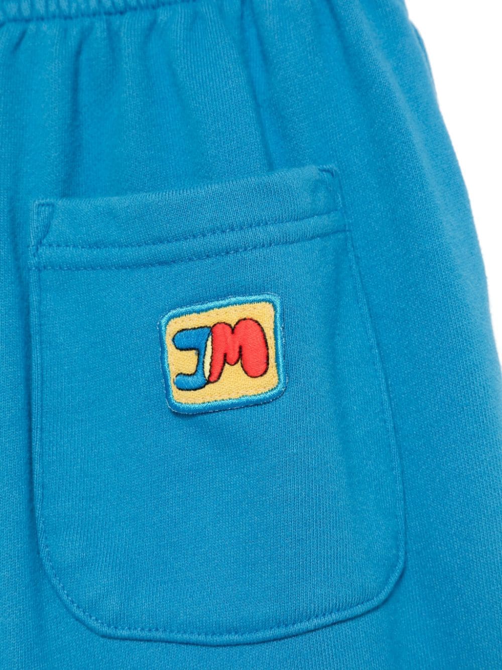 Pantaloni sportivi per bambina JELLYMALLOW blu con applicazione posteriore con logo - Rubino Kids