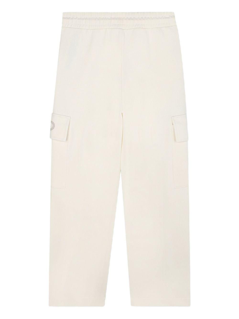 Pantaloni sportivi per bambina Michael Kors Kids bianchi con tasche cargo - Rubino Kids