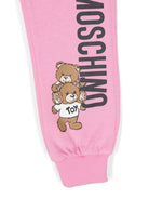 Pantaloni sportivi per bambina Moschino Kids rosa con stampa Teddy Bear - Rubino Kids