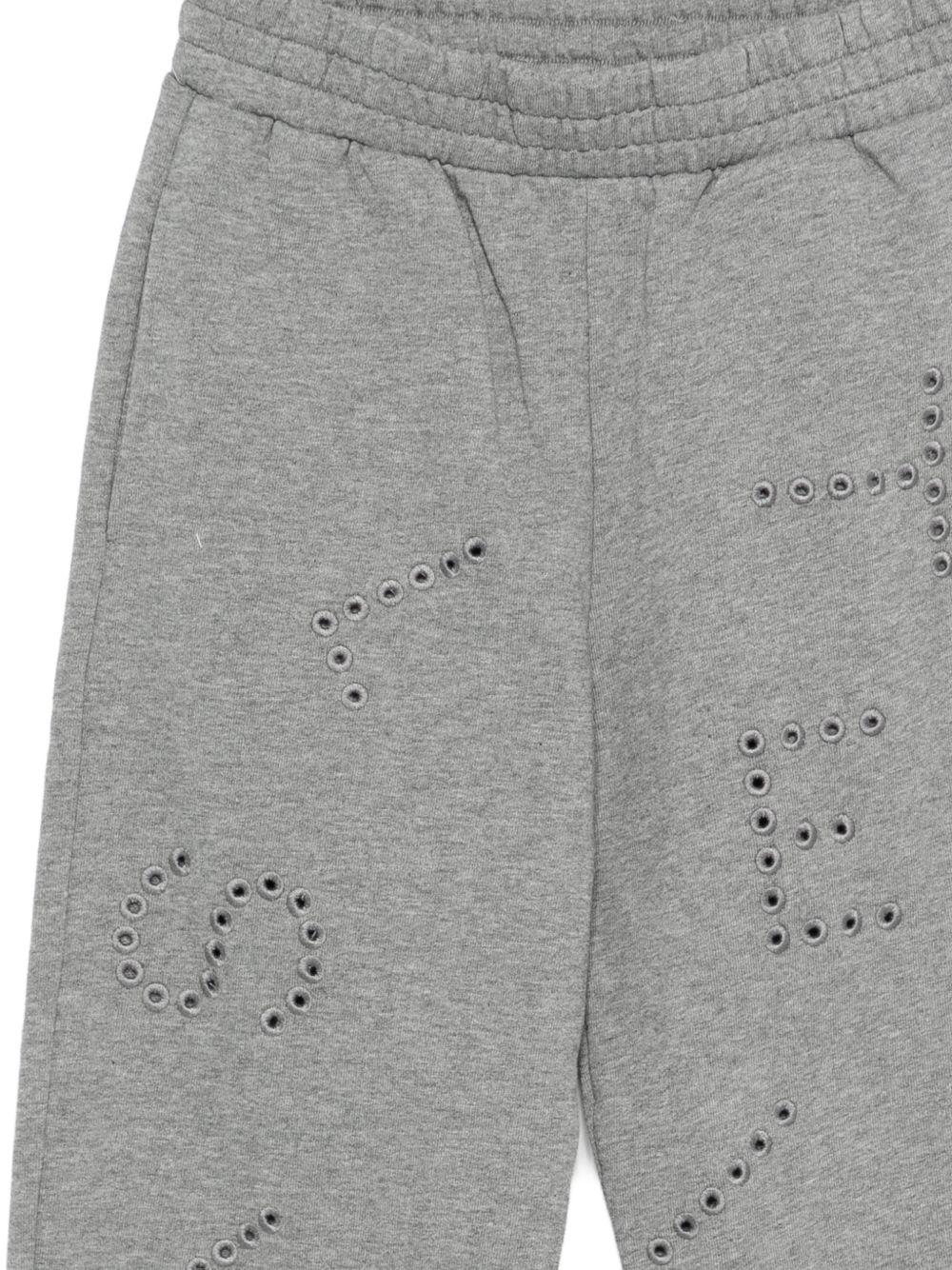 Pantaloni sportivi per bambina Stella McCartney Kids grigi con logo sul davanti - Rubino Kids