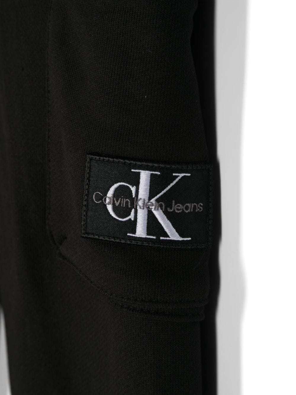 Pantaloni sportivi per bambino Calvin Klein Kids nero con applicazione logo - Rubino Kids