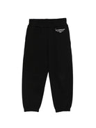 Pantaloni sportivi per bambino Givenchy Kids neri con logo sul davanti - Rubino Kids