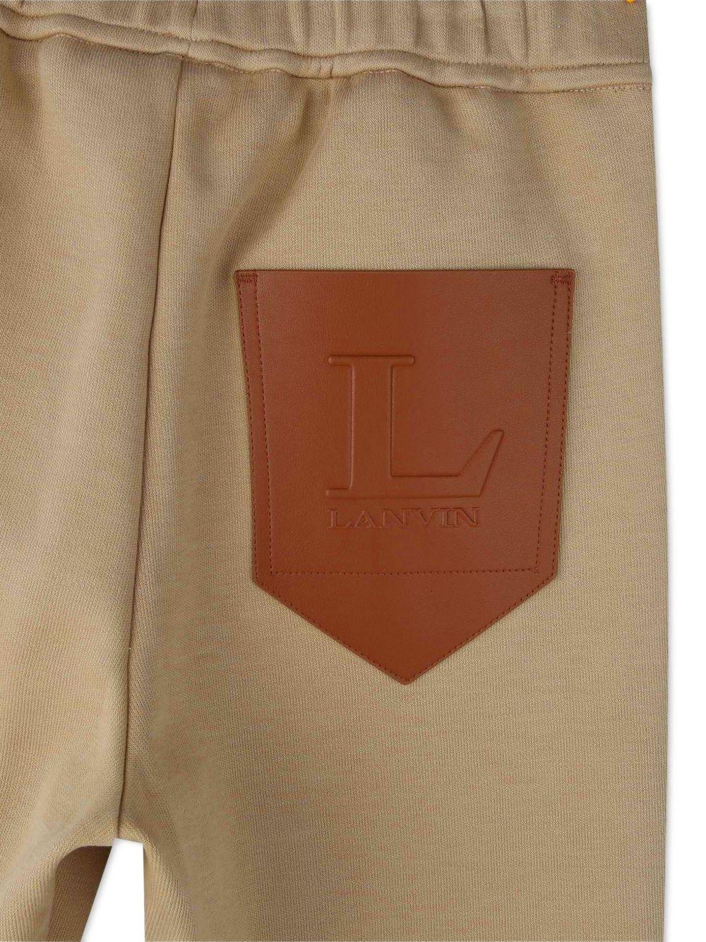 Pantaloni sportivi per bambino Lanvin Enfant beige con applicazione con logo - Rubino Kids
