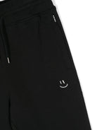 Pantaloni sportivi per bambino Molo Alvar nero con ricamo con smiley frontale - Rubino Kids