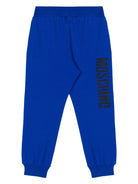 Pantaloni sportivi per bambino Moschino Kids blu con stampa logo - Rubino Kids