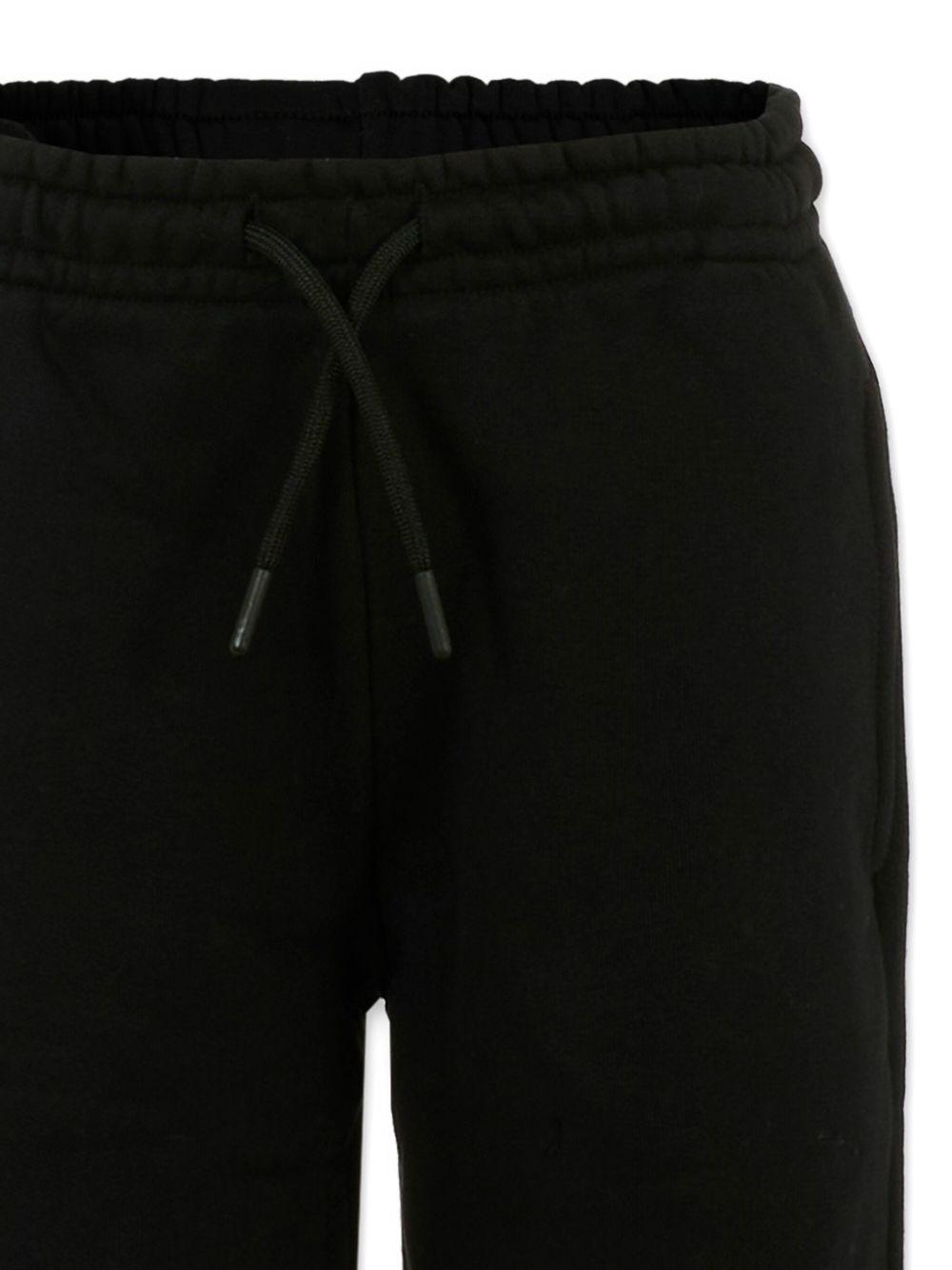 Pantaloni sportivi per bambino MSGM Kids nero con polsini elasticizzati - Rubino Kids