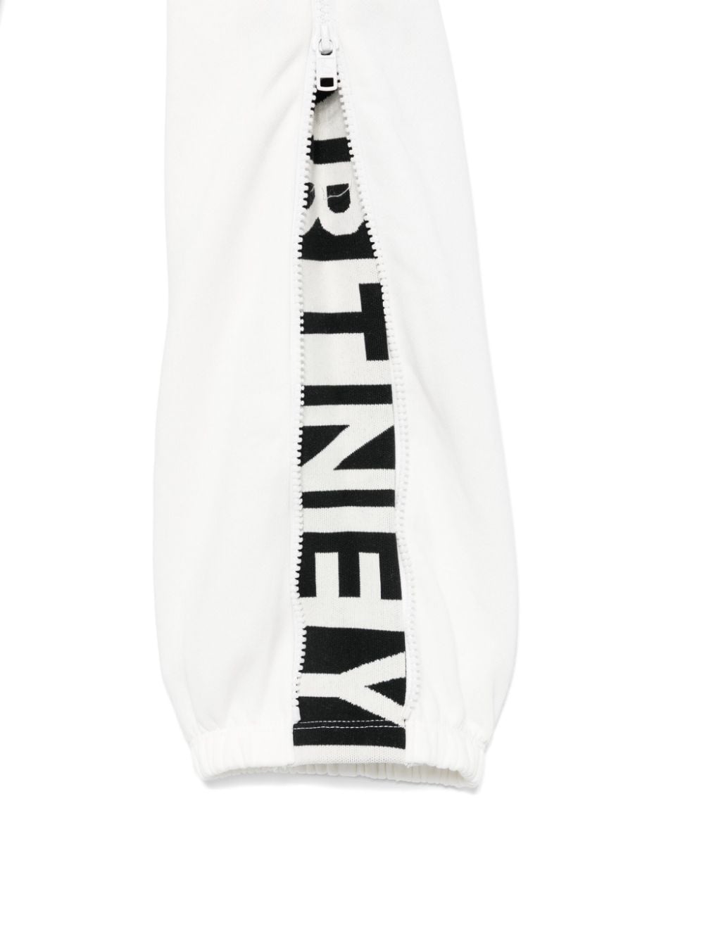 Pantaloni sportivi per bambino Stella McCartney Kids bianco con zip e decorazione sulla manica - Rubino Kids